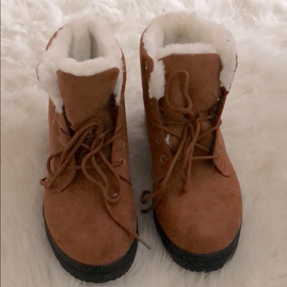 Brownish red colored boots
